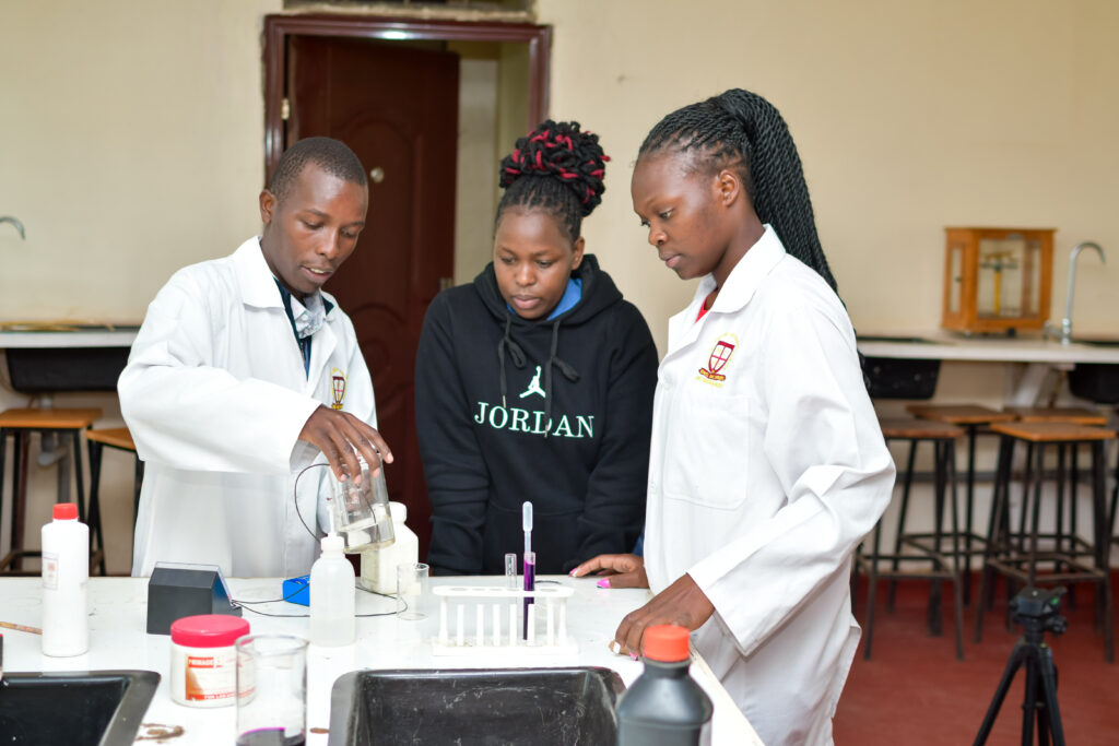 Students practicing clinical procedures in the Clinical Skills Laboratory using modern medical training equipment under instructor supervision.